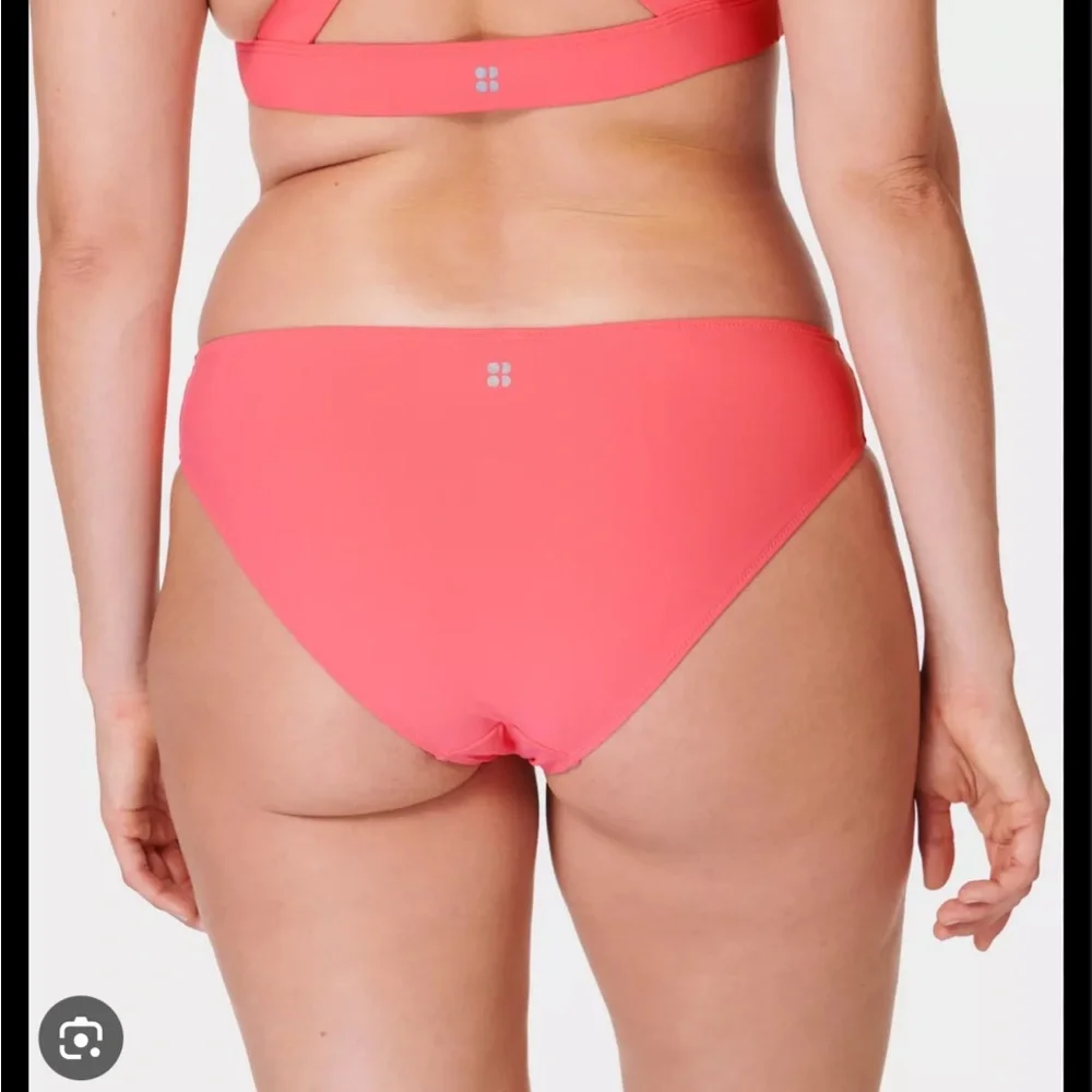 NWOT Flawed Sweaty Betty Light Pink Swim Bottoms US 8